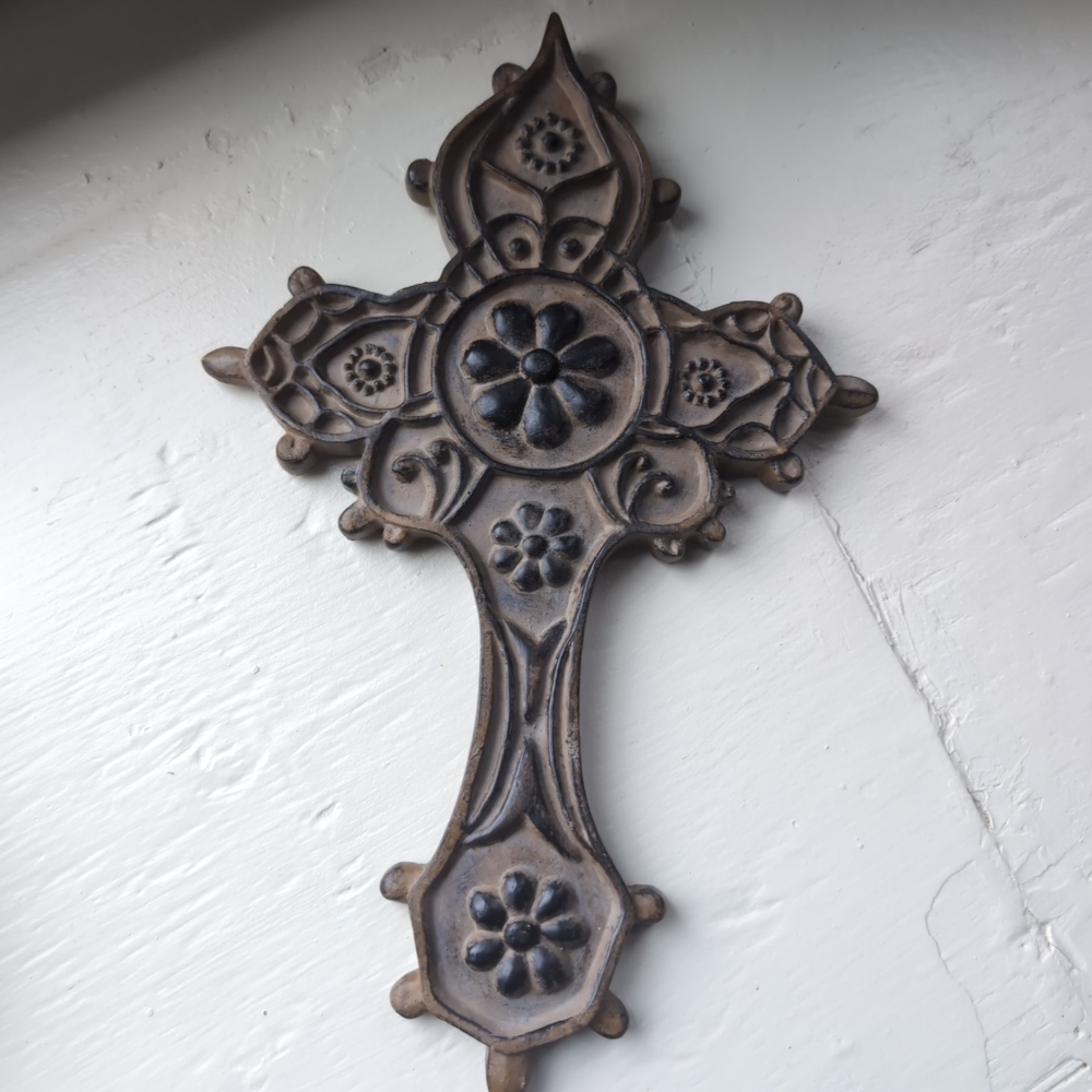 Brown ornate cross wall decoration